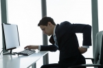 health and safety risks of using a computer, computer ergonomics, bad posture during computer use leads to back pain, Eyeglasses