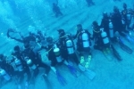 Guinness world record, Top Stories, nri and team creates guinness world record, Scuba diving