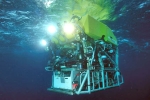 Titanic tourist submarine clue, Titanic tourist submarine visuals, a submersible robot in search of titanic tourist submarine, Titanic