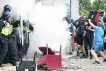 attack on immigrants, Holiday express in hotel burnt, uk protest 400 arrested, Up riots