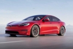 Tesla new electric car breaking news, Tesla car without steering, tesla to launch electric hatchback without a steering wheel, Tesla car
