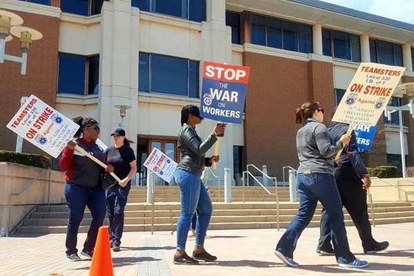 Striking Kane County Workers Challenge Lauzen to End Walkout